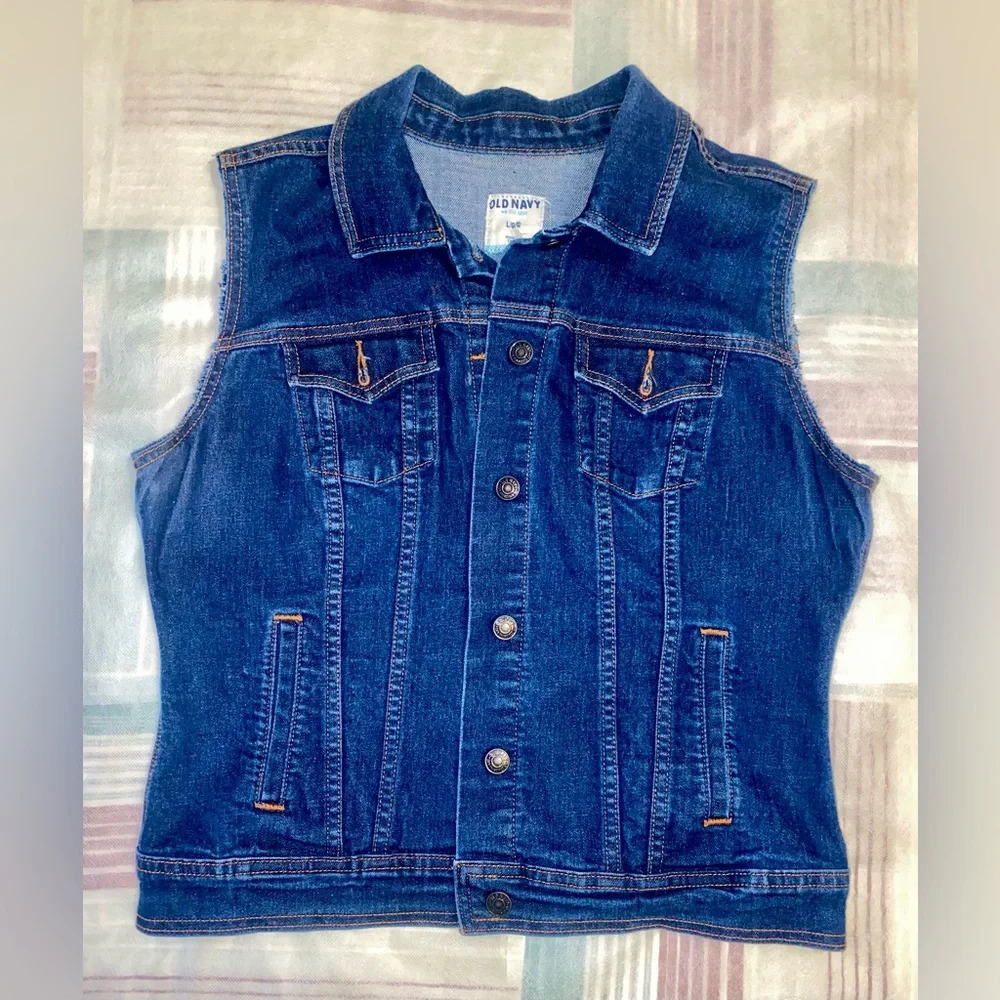 Old navy denim jacket with a handma art on a back